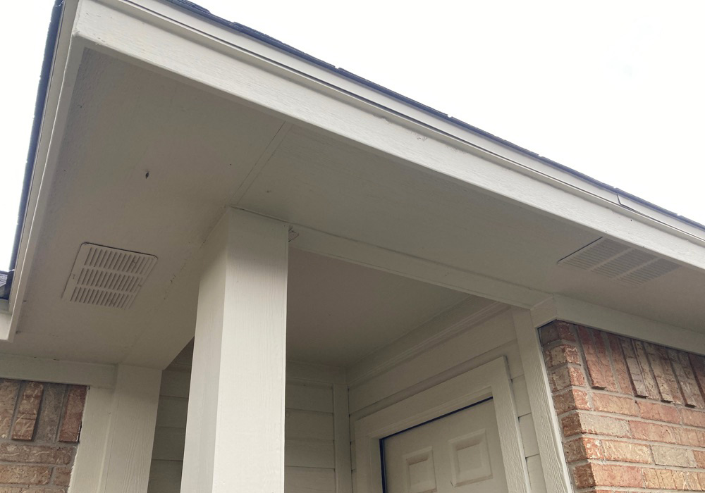 Ground-Up View of White Repaired Porch Roof